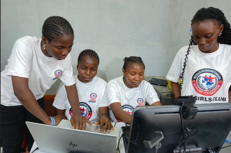 Girls learning digital skills together at WHSF